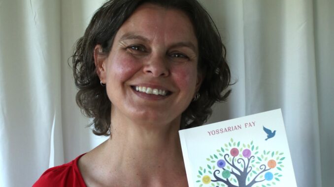 Yossarian Fay with her book - cropped